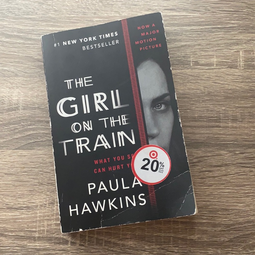 The Girl on the Train paperback book Paula Hawkins bookclub easy read